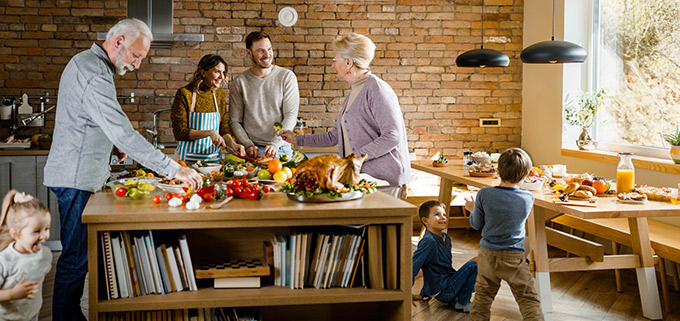 Multi generational family preparing holiday dinner