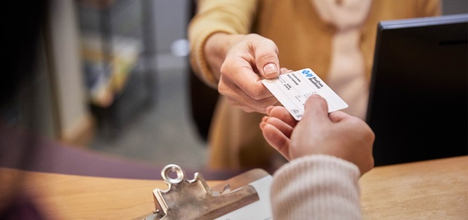 Member presenting BCBSIL Member ID card