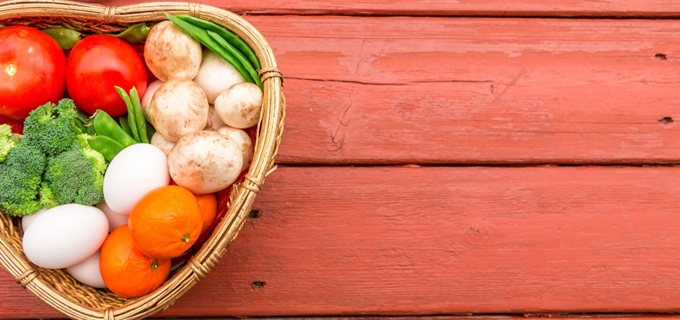 Vegetables in a basket on a table