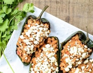 Chicken stuffed poblano pepper tacos with queso fresco